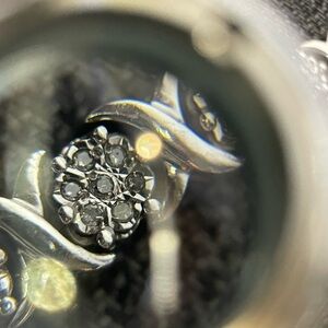 925 sterling silver with 154 accent diamonds 7 clusters X22